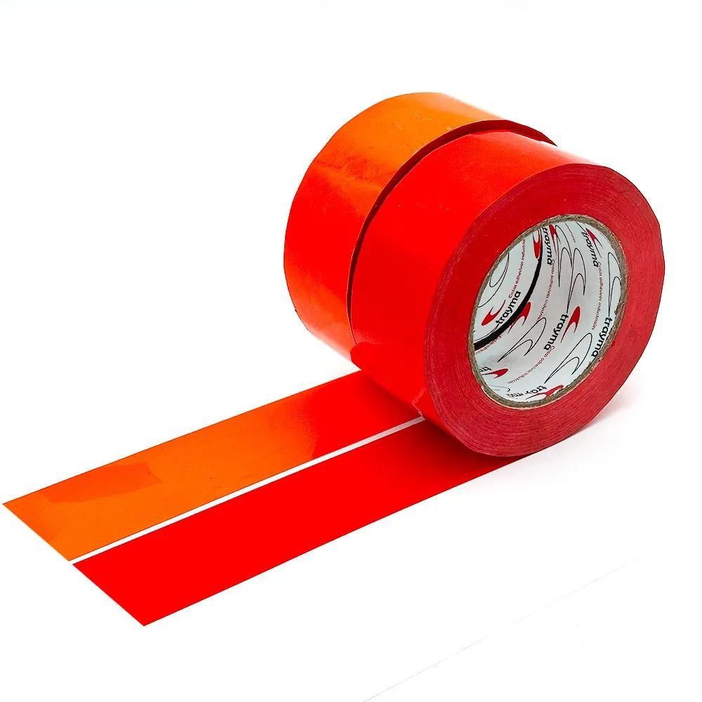 Imagen de cinta adhesiva naranja fluor para señalización industrial y marcaje de suelos.